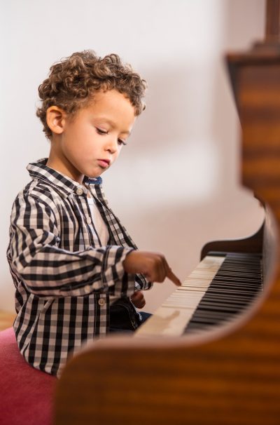 Boy playing piano
